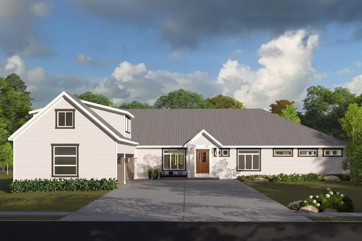 Front view of the house with a covered entry and a 3-car side-loading garage.