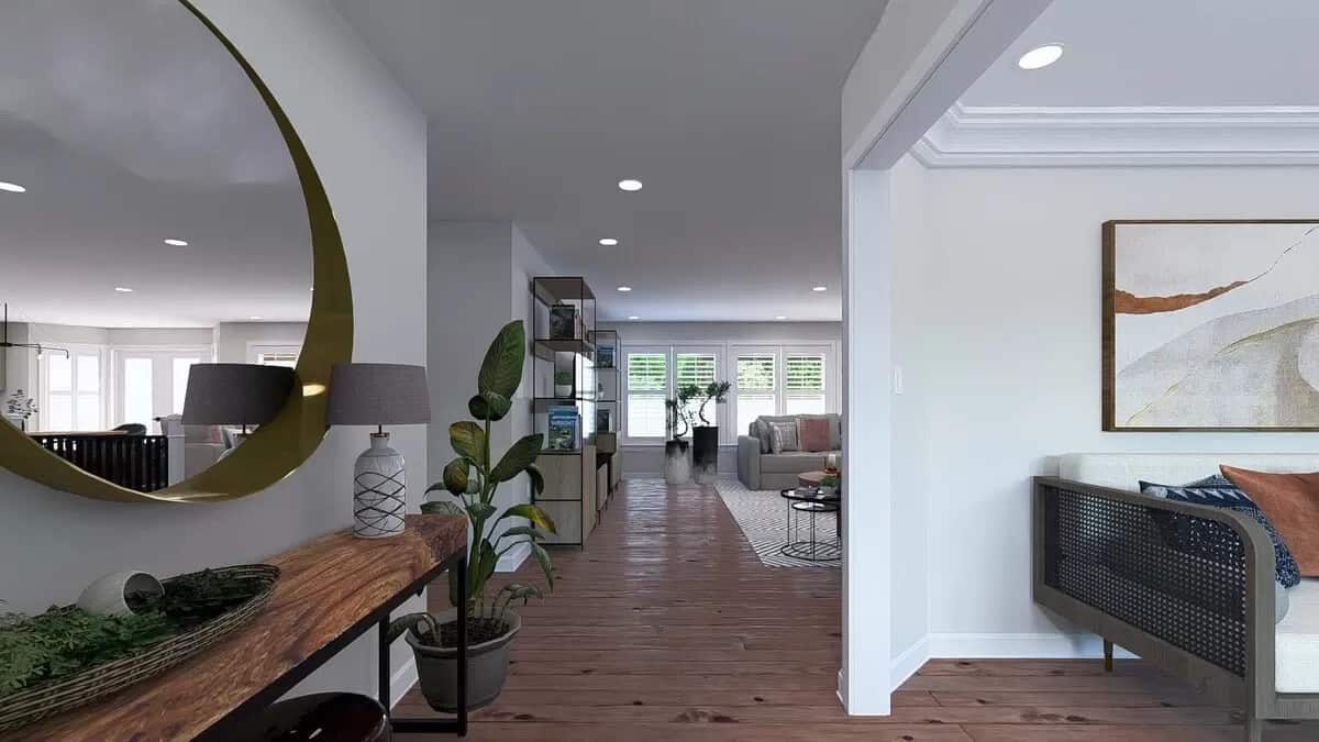 Foyer with a wood-top console table and views of the open living space.