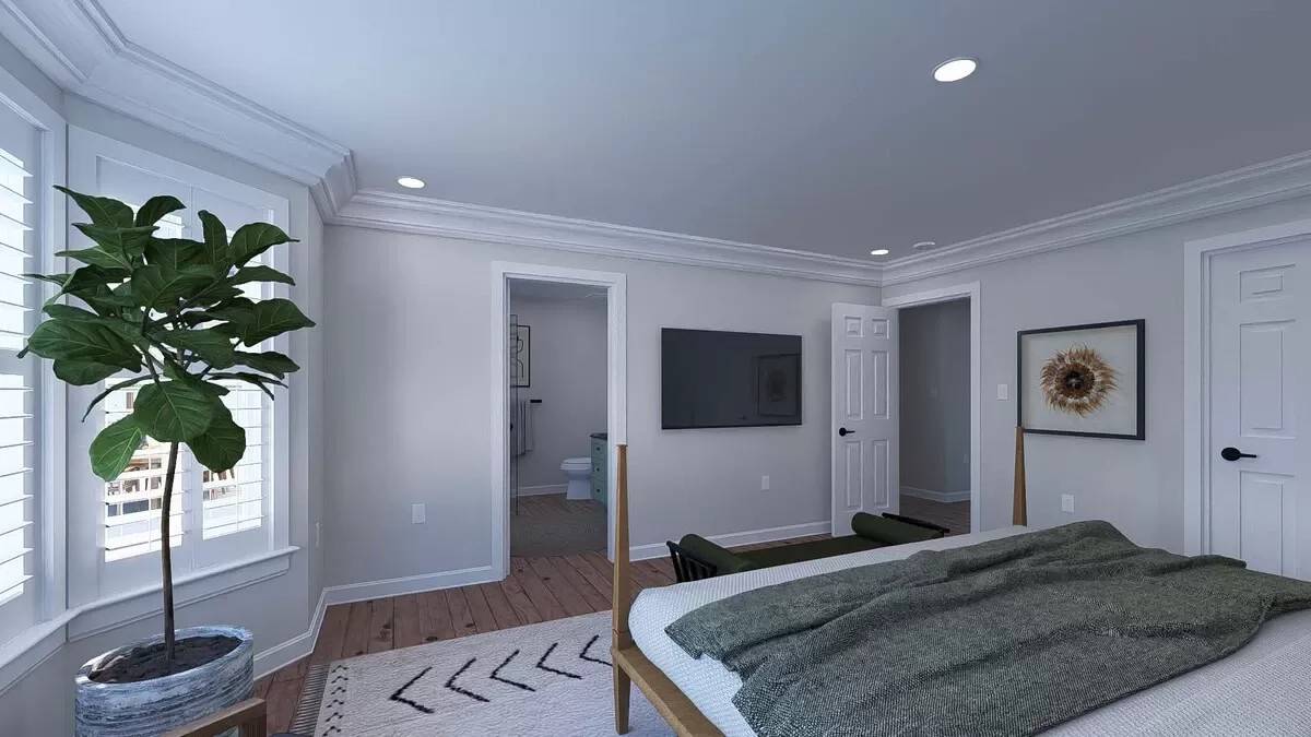 The primary bedroom includes a wall-mounted TV, an ensuite bath, and a walk-in closet.