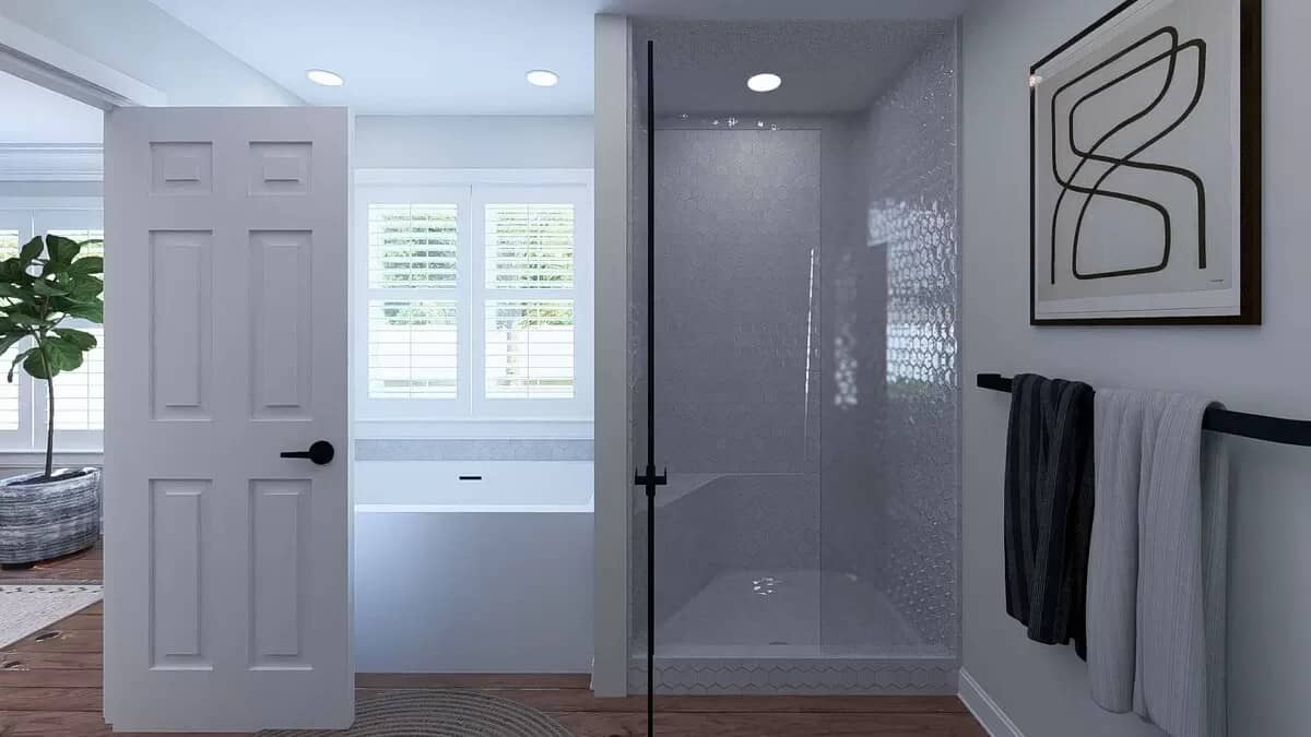 The primary bathroom includes a walk-in closet and a bathtub.