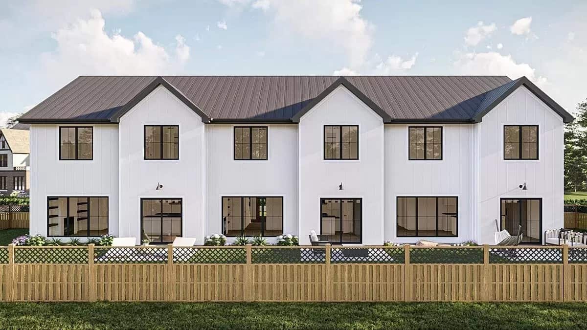 Rear view of the house with open patios and large windows.