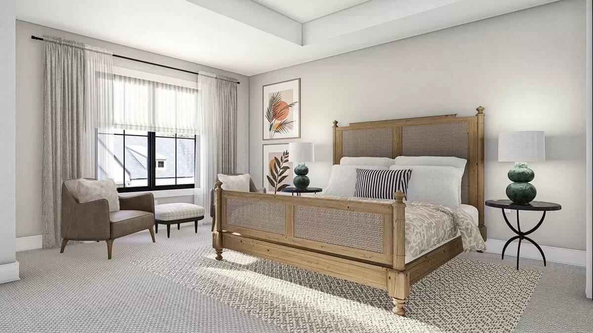 The primary bedroom includes a sitting area by the window.