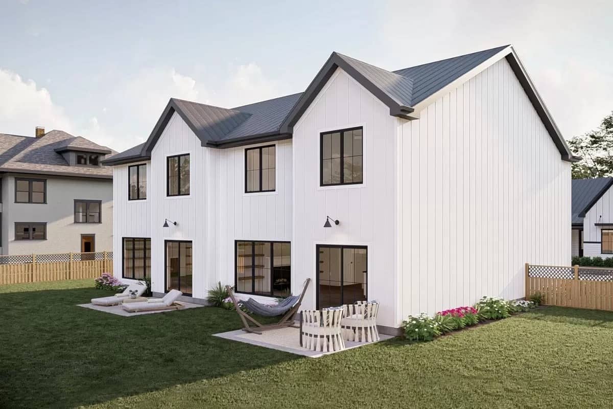 Rear-left view with vertical siding and open patios.