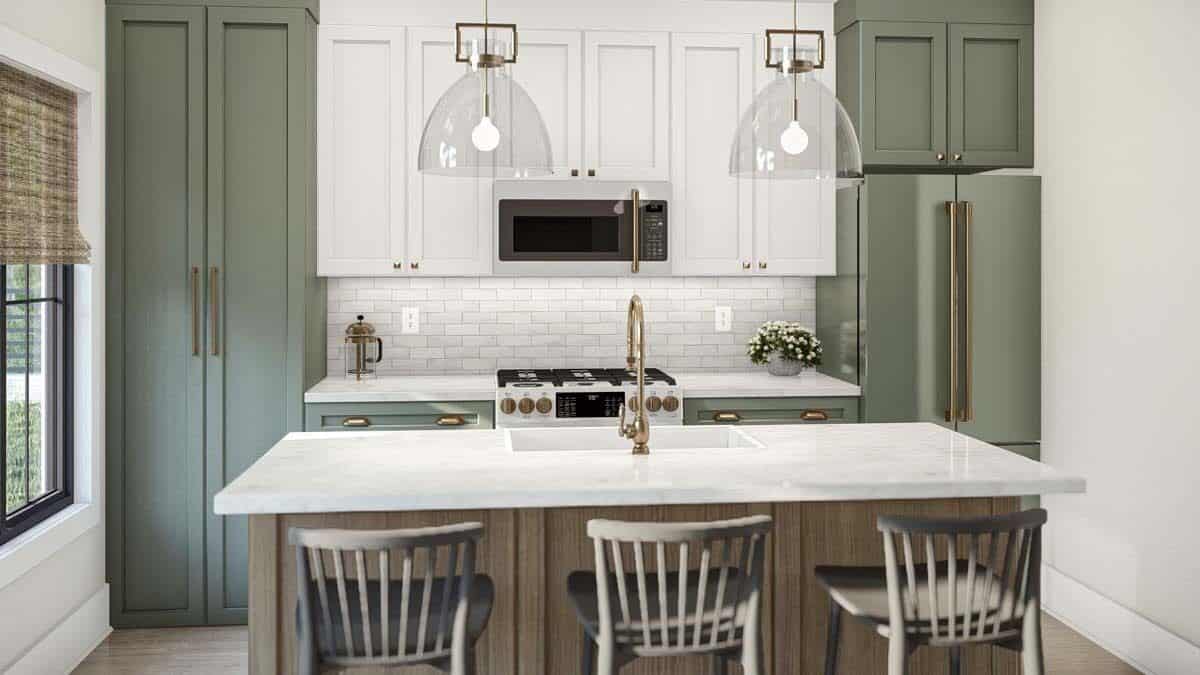 Kitchen with multicolored cabinets, a subway-tiled backsplash, and a breakfast island with a prep sink.