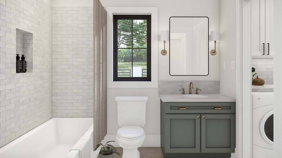 Bathroom with a sink vanity, a tub and shower combo, and a connecting laundry.