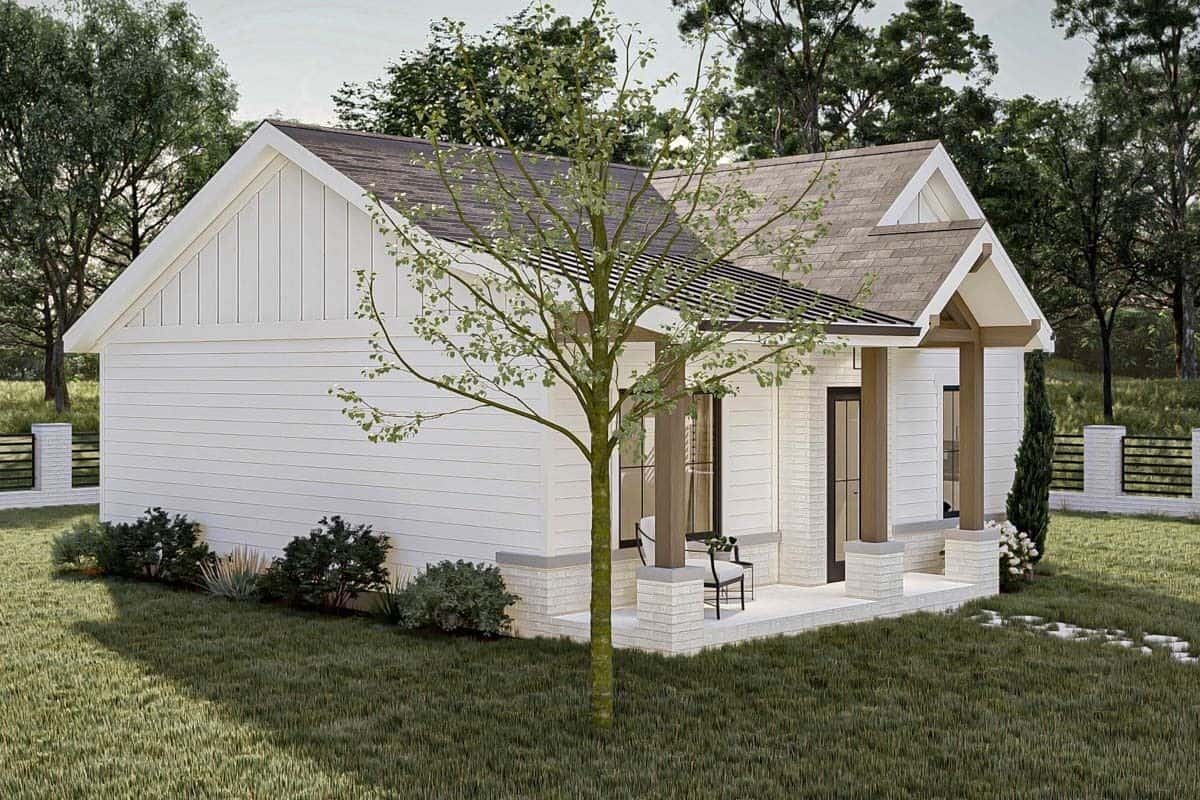 Front-left view with clapboard siding and a covered entry porch supported by brick base columns.