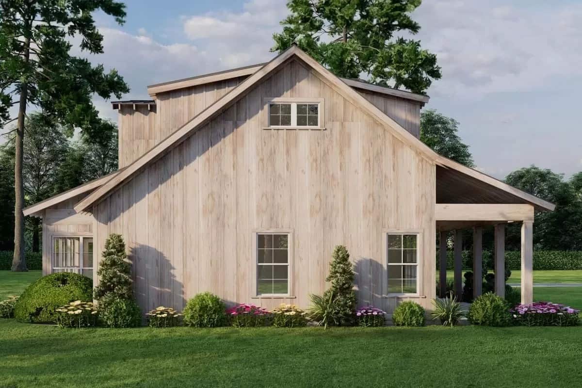 Right view of the house with a covered patio and framed windows.
