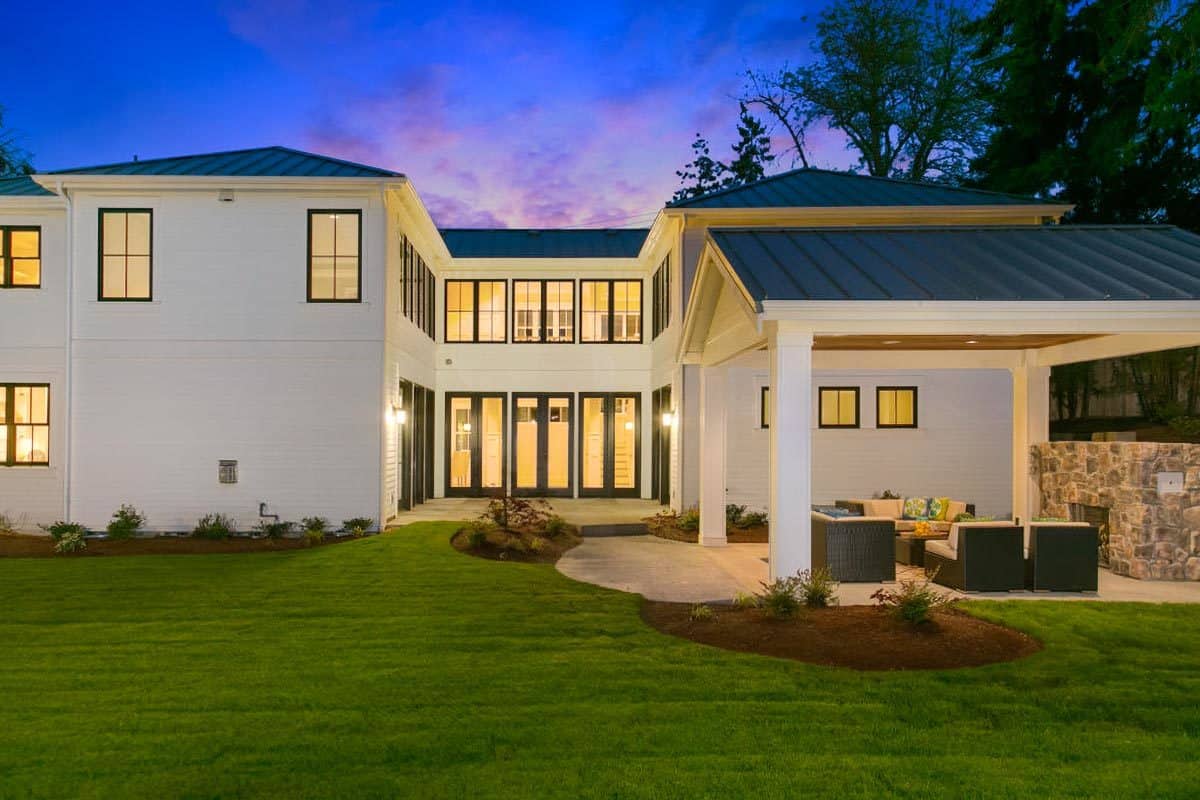 Rear view with a covered patio and a courtyard.