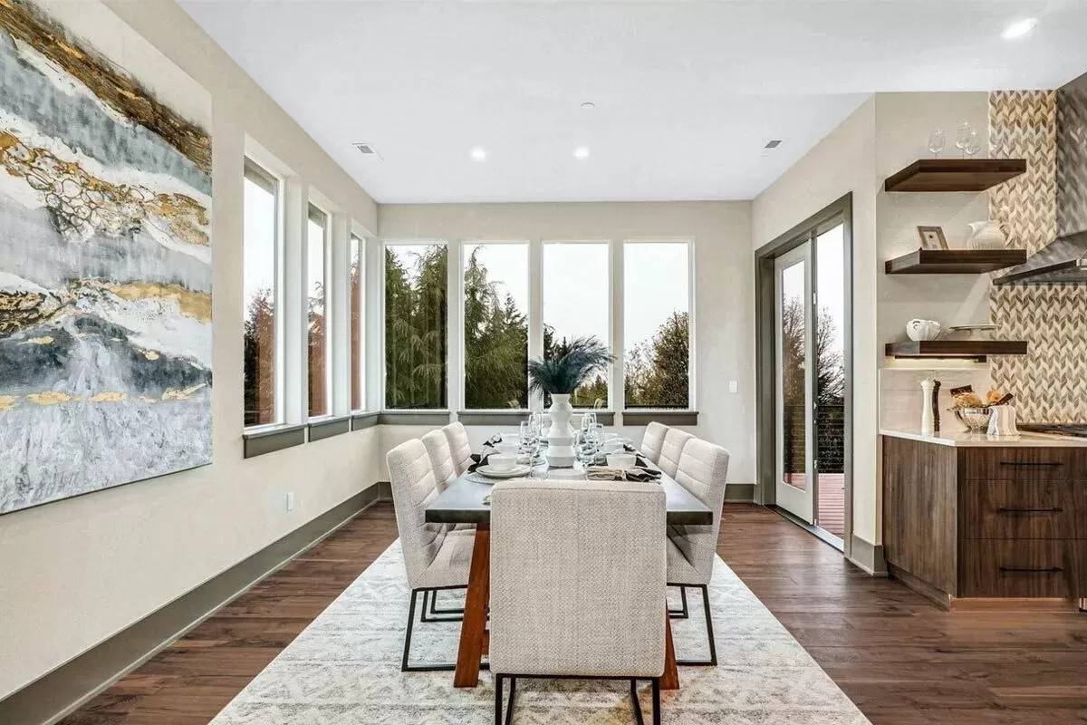 Breakfast nook with a contemporary dining set and outdoor access via sliding glass doors.