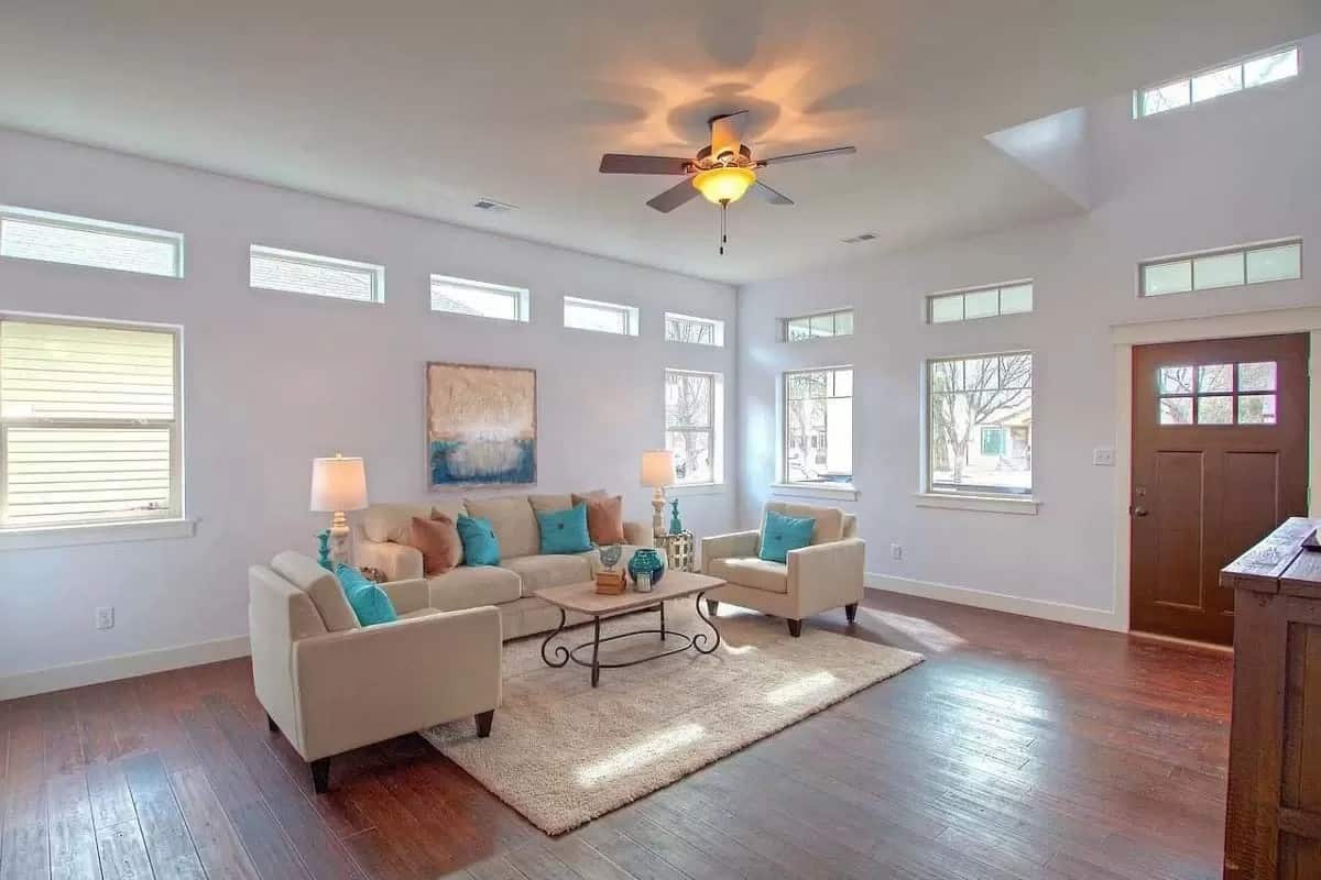 Clerestory windows bathe the living room with natural light.