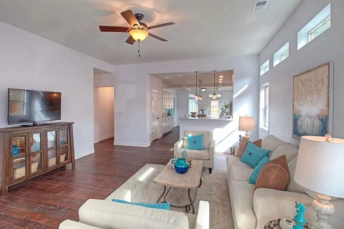 The living room opens completely into the kitchen.