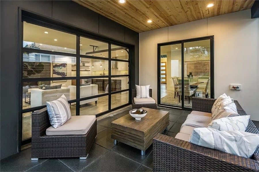 Sliding glass doors in the covered patio open into the dining room.