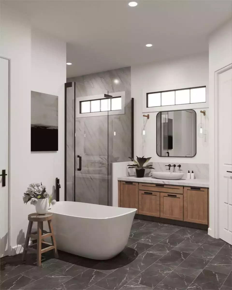Primary bathroom with a soaking tub, a walk-in shower, and a wooden vanity topped with a vessel sink.