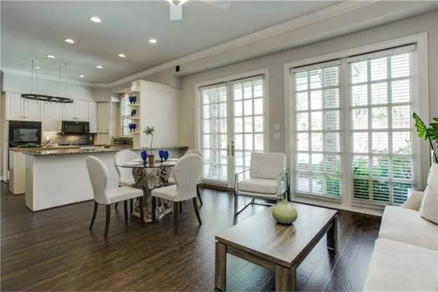 Kitchen and breakfast nook with two sets of French doors that open to the rear patio.