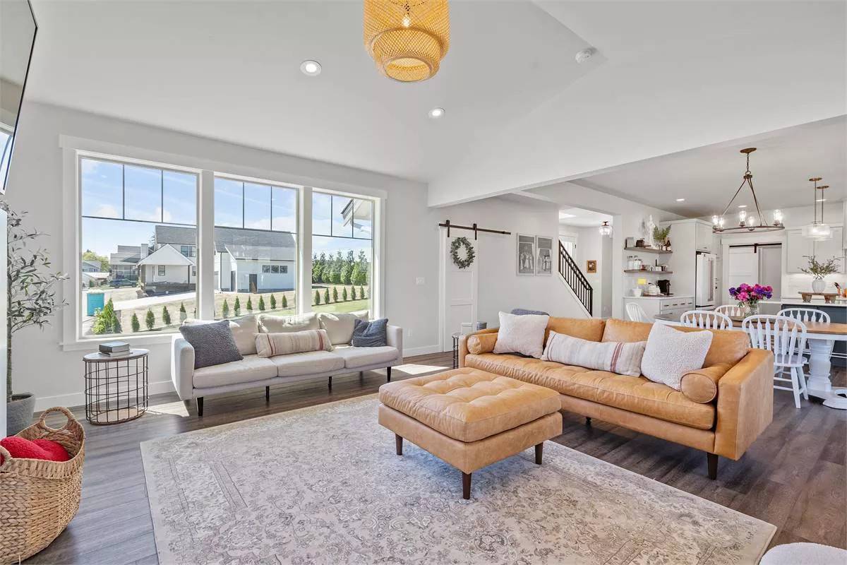 A trio of windows bathes the great room with natural light.