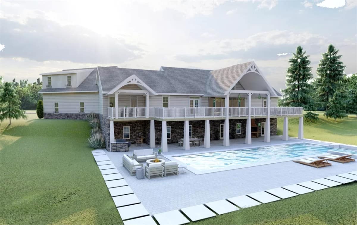 Rear-right view showcasing the walkout basement and pool area.