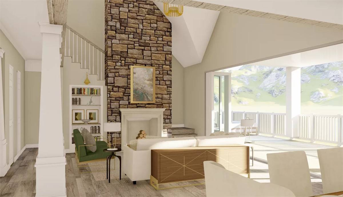 Great room with a white sofa, a stone fireplace, and a tall vaulted ceiling.
