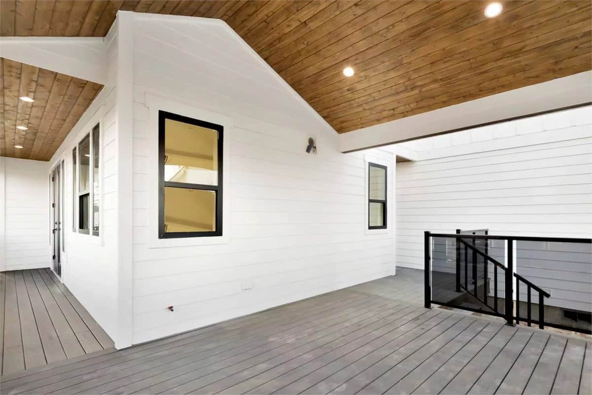In-law suite with private entrance and wood-paneled ceilings.