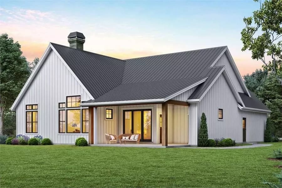 Rear view of the house showcasing the covered patio supported by timber posts.