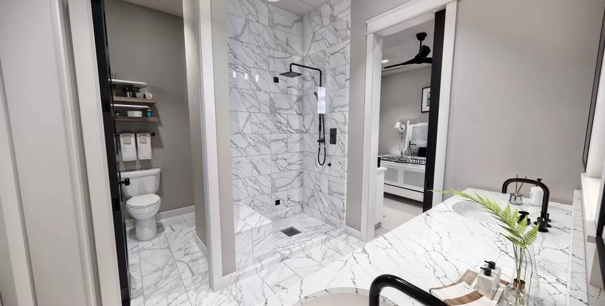 The primary bathroom includes a toilet room and a walk-in shower with a tiled bench.