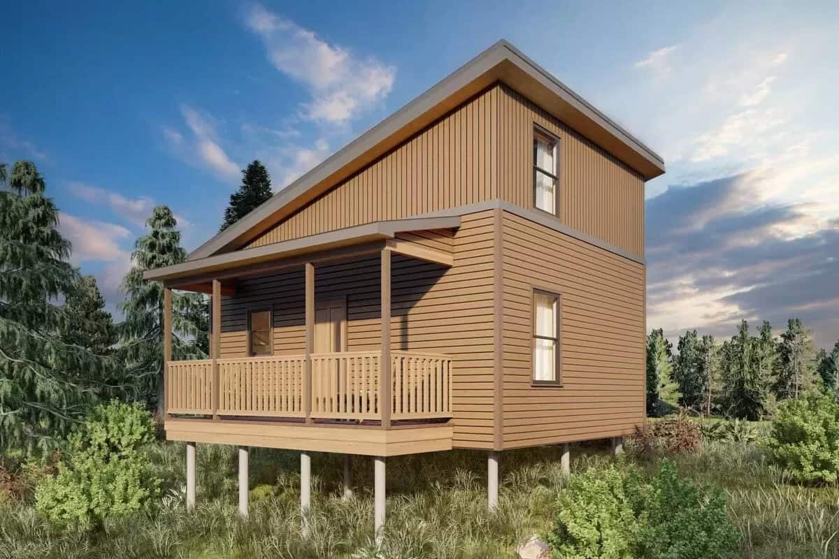 Rear view of the house with a covered deck framed with wooden railings and posts.