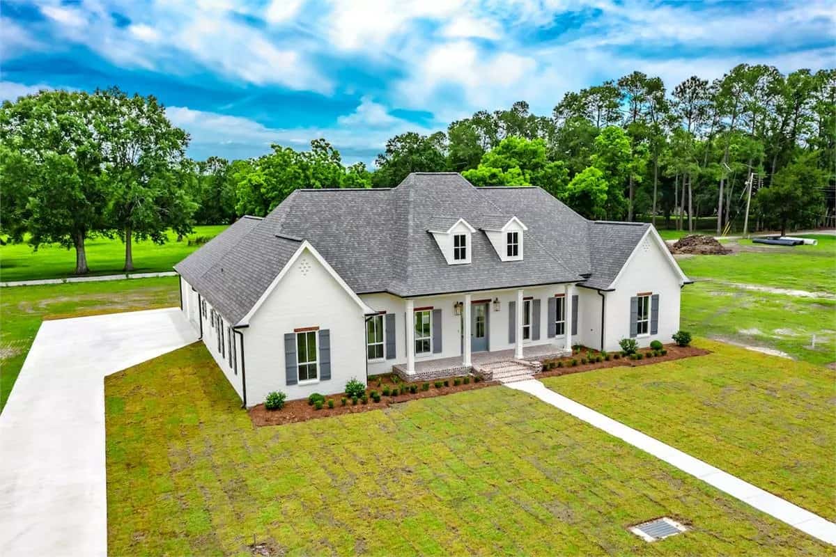 Aerial front view of the country style Wildwood home.