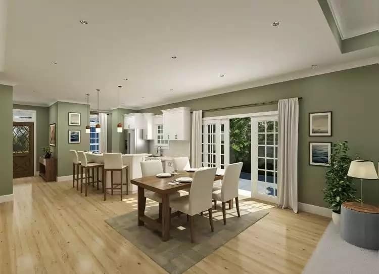 Kitchen and dining area with hardwood flooring and sliding glass doors that open onto the outdoor living.