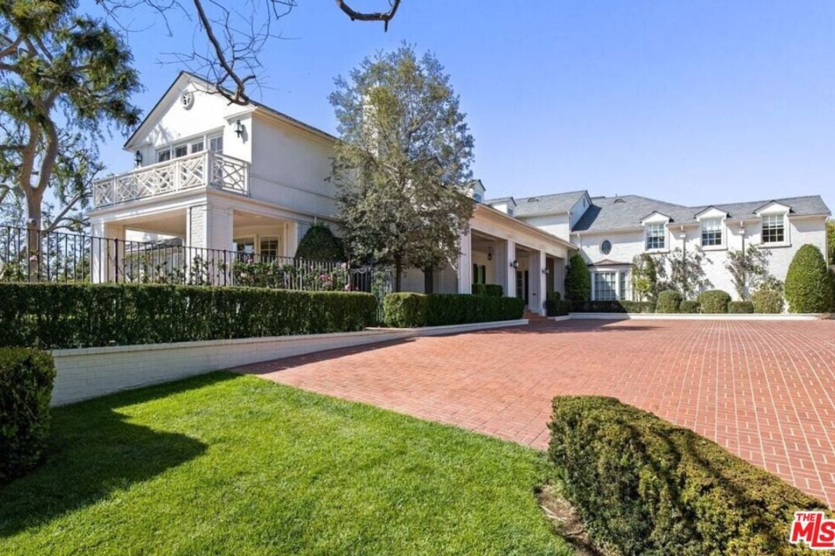 A front yard with brick paving.