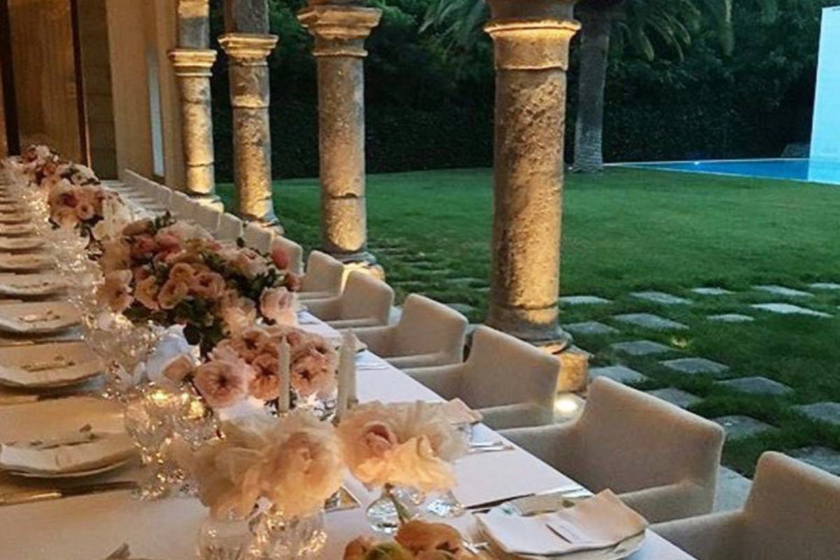 An outdoor dining area with expansive table/