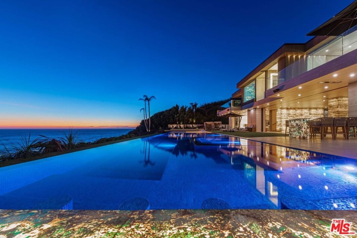 A swimming pool in the backyard.