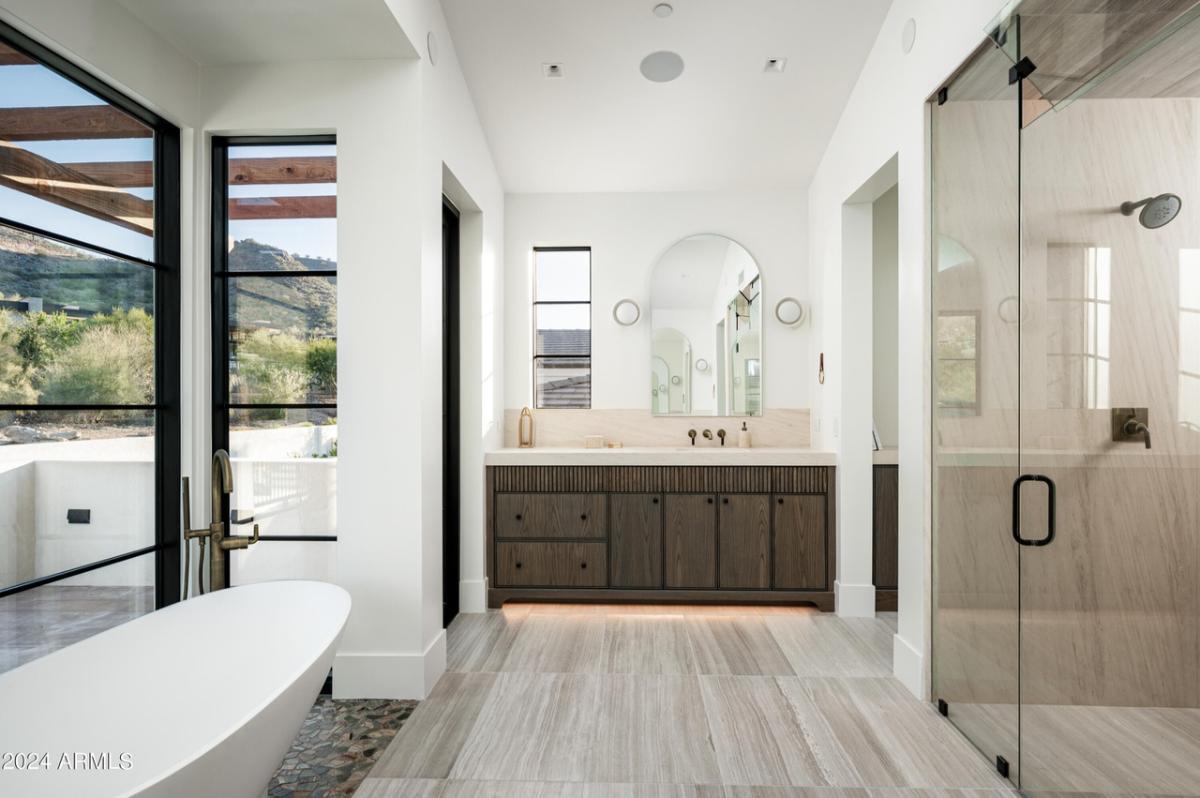 Bathroom with a walk-in shower and soaking tub.