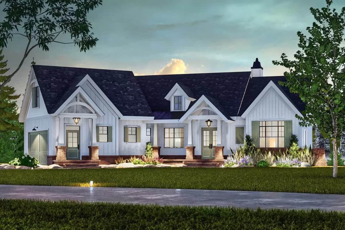 Front view with a covered entry and an angled side-loading garage.
