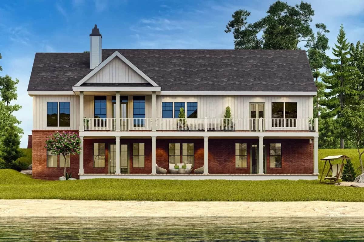 Rear view with stacked porches supported by white columns.