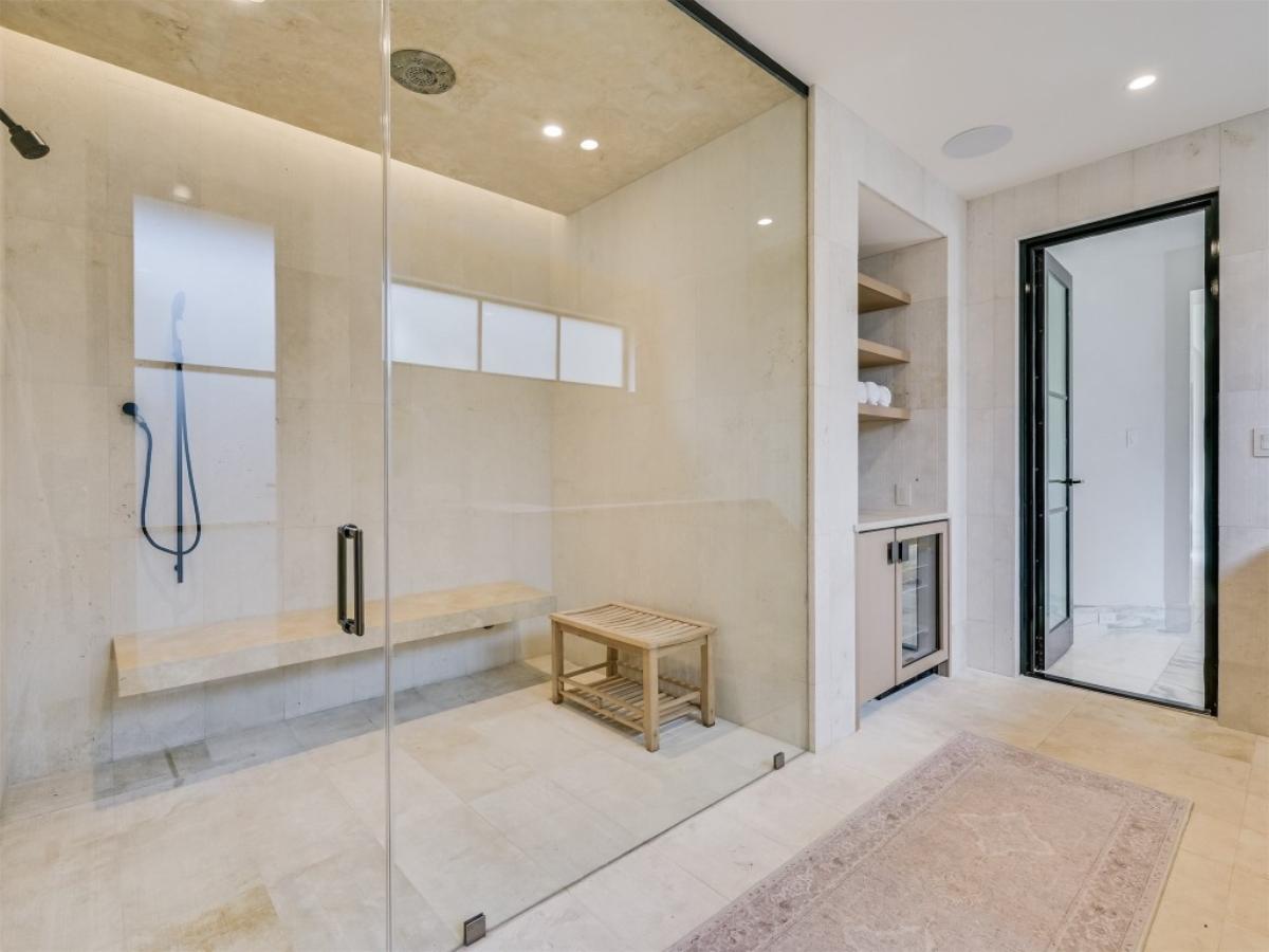 Bathroom with a walk-in shower.