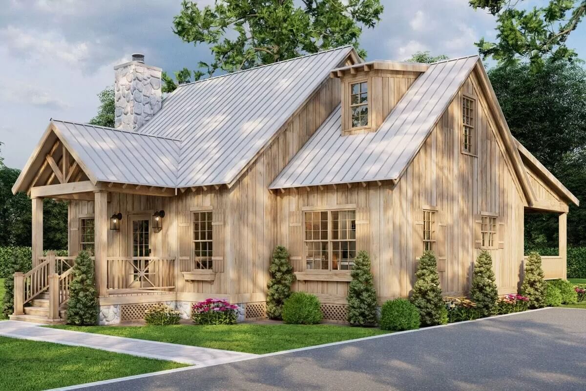 Front-right view with vertical wood siding, a shed dormer, and a covered entry porch.