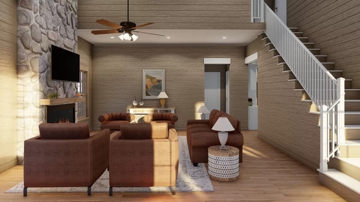 A tall ceiling mounted with an iron fan crowns the great room.