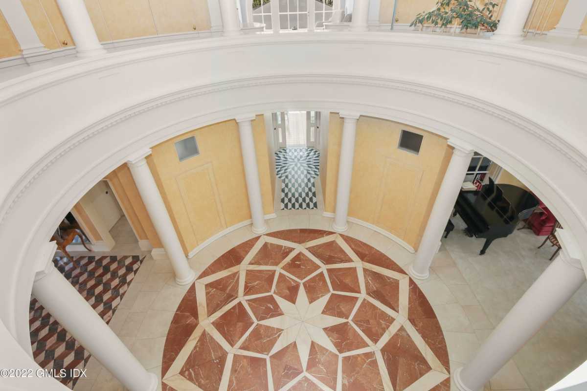 An atrium with a tiled floor.