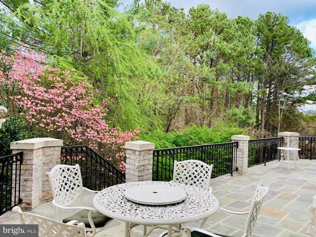 Patio with a table and chairs.