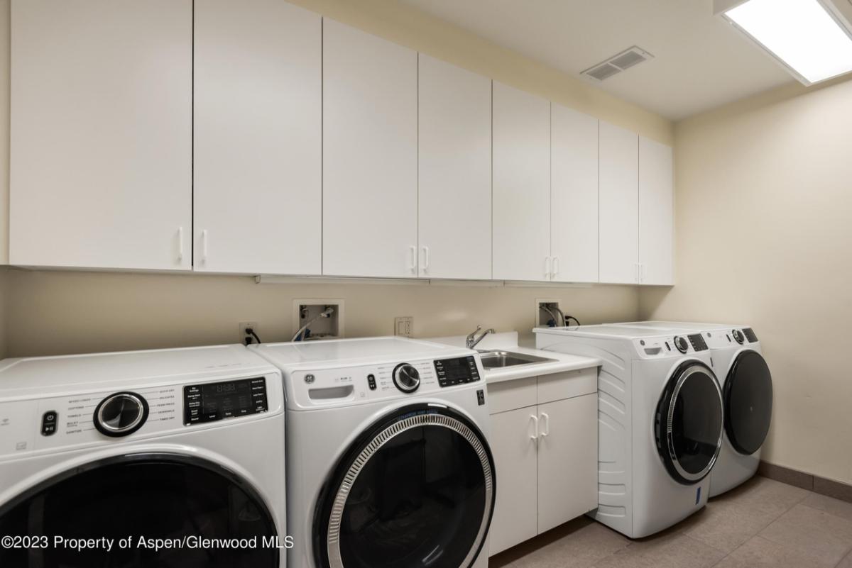Laundry room with washer and dryer.