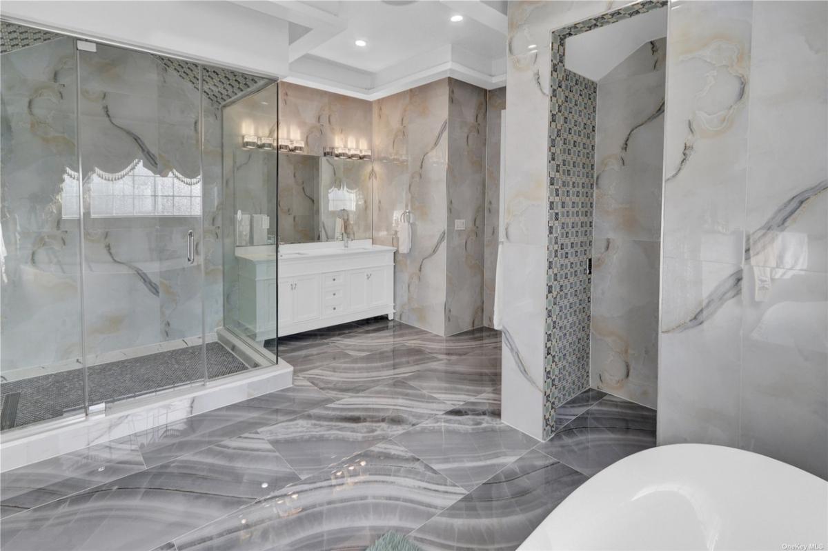 Bathroom with a walk-in shower.