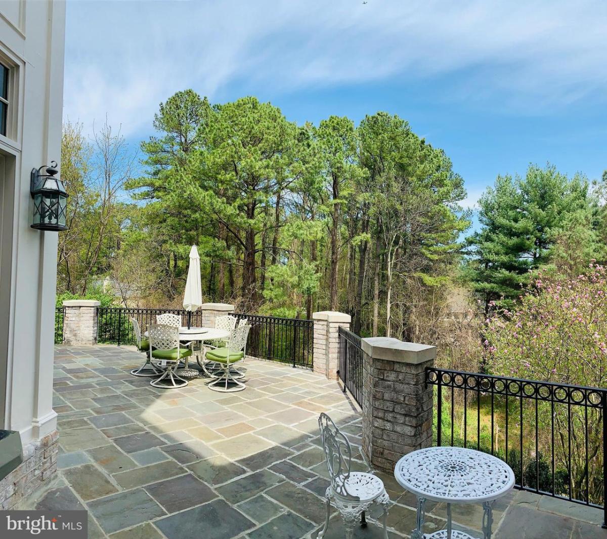 Patio with tables and chairs.