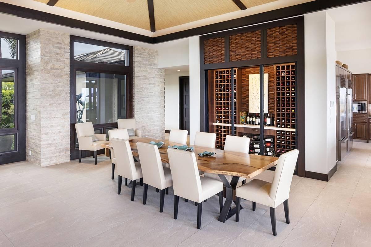 Dining area with wine cellar.