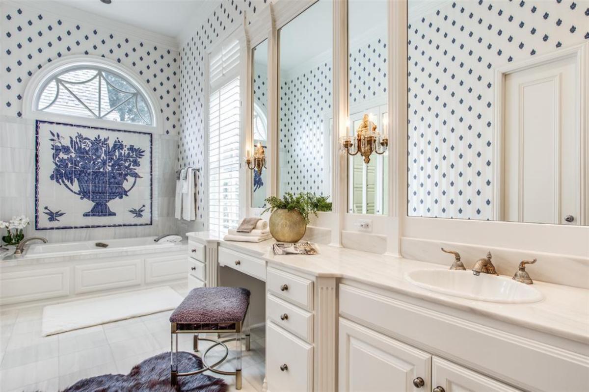 Bathroom with sink and a soaking tub.