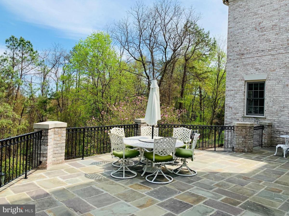Patio with a table and chairs.