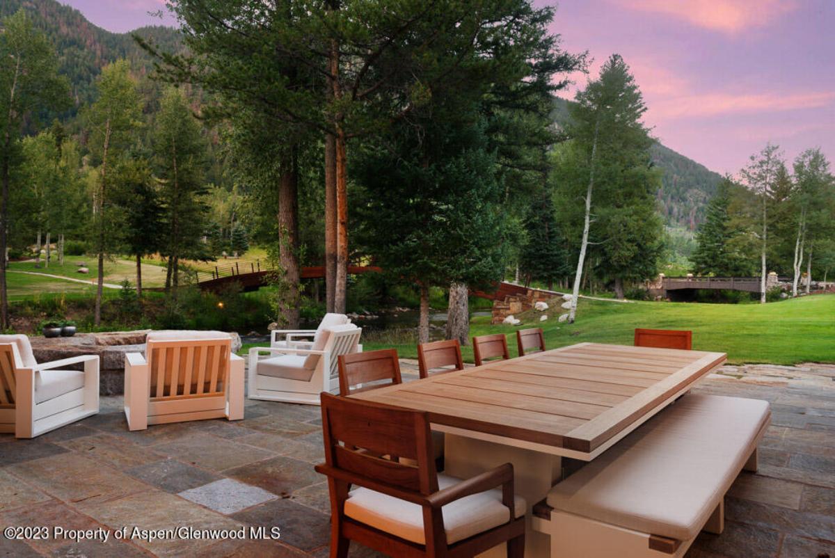 Patio with tables and chairs.