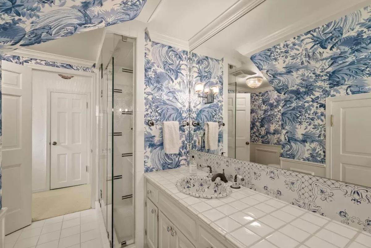 Bathroom with a sink and a walk-in shower.