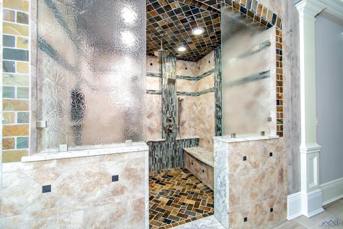 Bathroom with a walk-in shower.