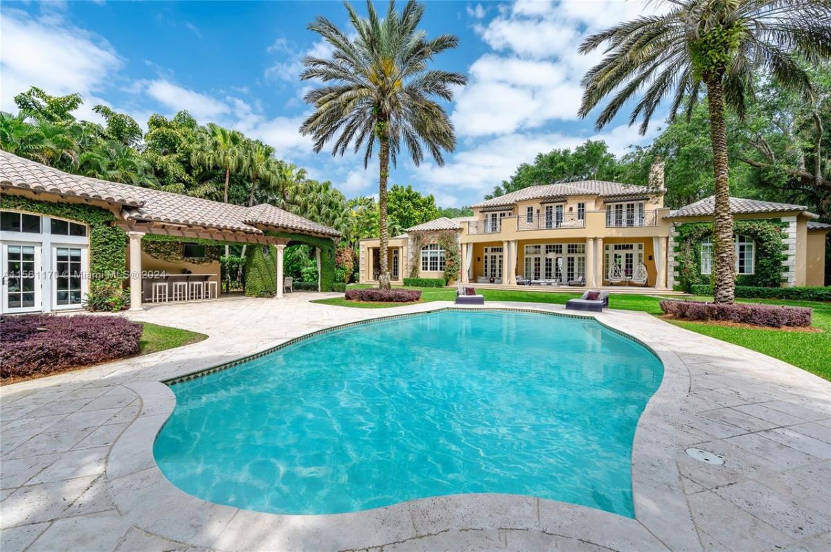 Pool with lounge chairs.