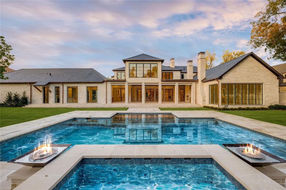 Rear view of the house with a pool.