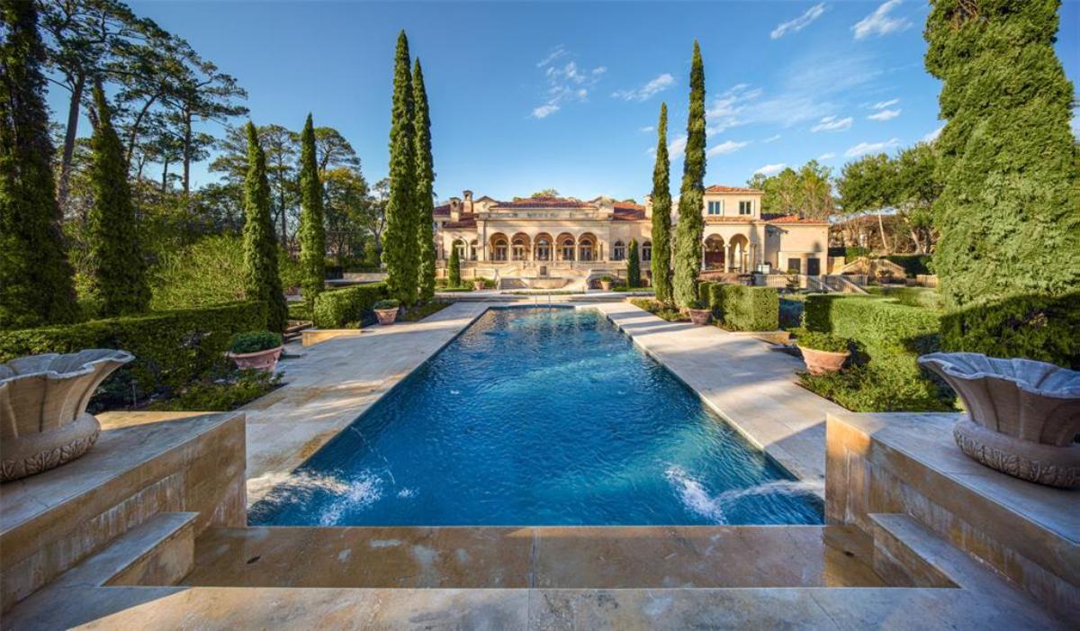 Pool surrounded by trees.